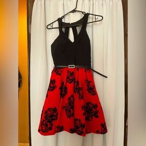 Formal dress with matching belt.